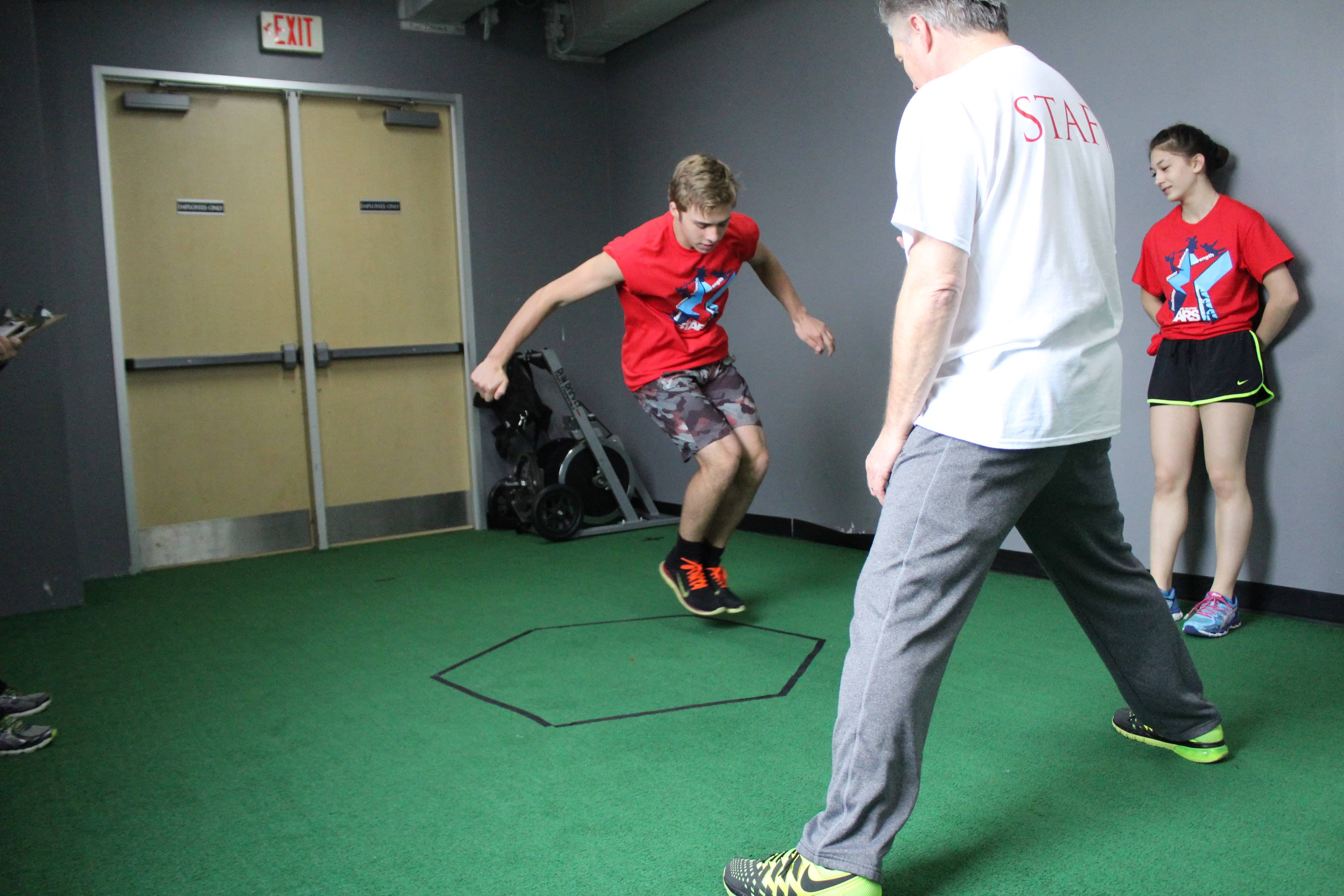 A figure skating athlete does the hex jump at a STARS combine